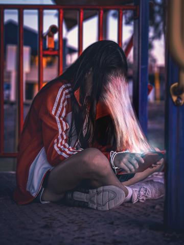 A face being sucked into a phone